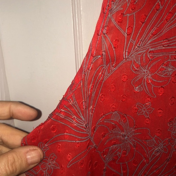 Red Sleeveless Sung Top with Floral Design. Ruffled neck,tie - at front preloved - Picture 4 of 7
